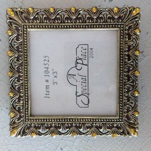 Metal picture frame with yellow stones, glass/picture size 3"x3"